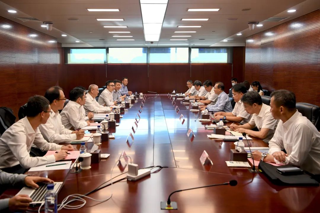 華電集團黨組書記、董事長江毅會見隆基綠能總裁李振國